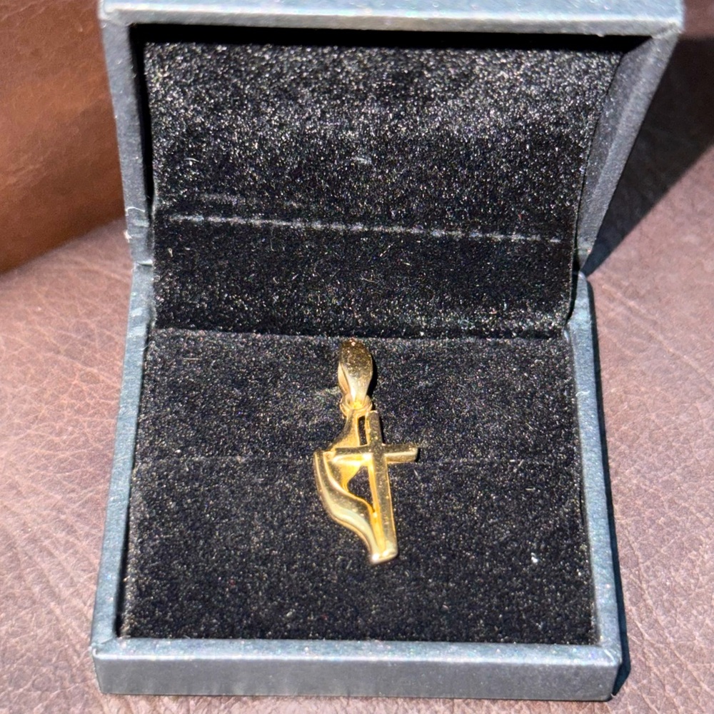 14kt Gold cross and flame pendant